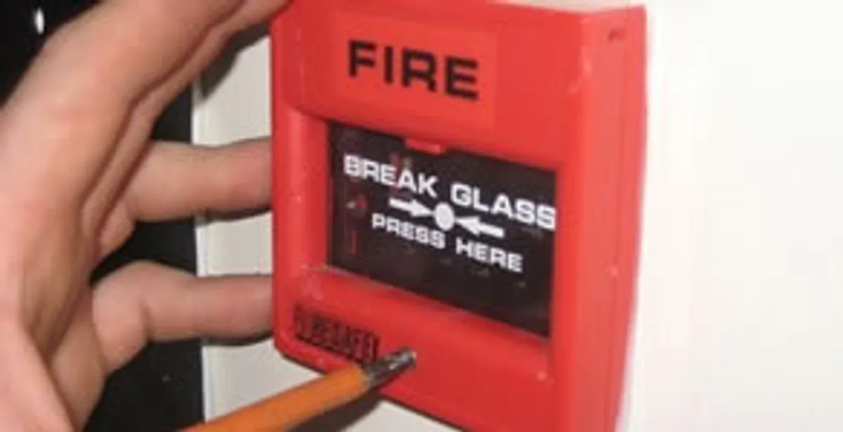 fire alarm installation service showing manual fire alarm pull station installed by licensed electricians in Fort Wayne, IN