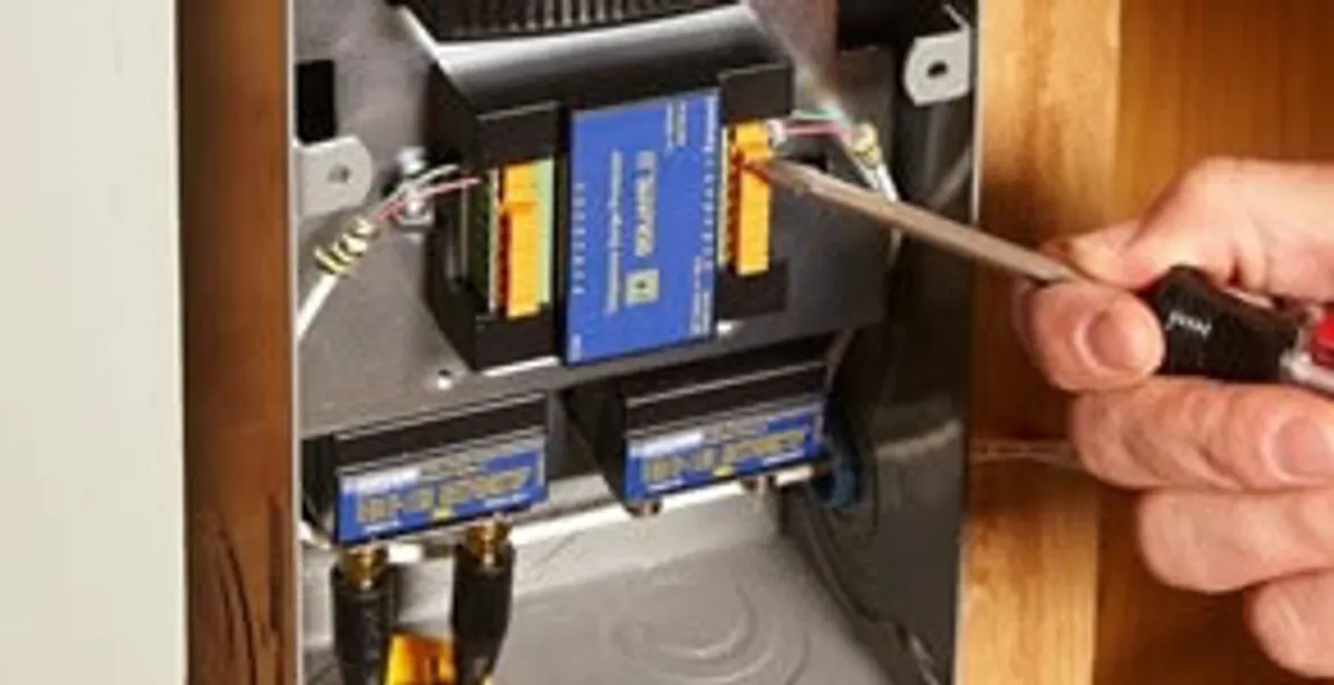 Whole home surge protection device being installed by a licensed electrician to protect electrical systems in Fort Wayne, IN